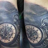 Real photo like gorgeous antic old mechanic pocket clock tattoo on leg