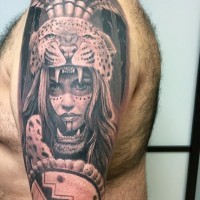 Real photo like shoulder tattoo of tribal woman portrait with shield