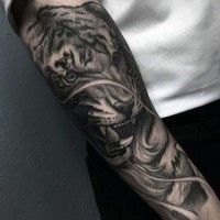 Real photo like very detailed black and whited on sleeve tattoo of roaring tiger