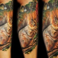 Real photo style painted and colored cute squirrel tattoo on leg