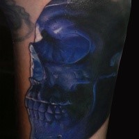 Realism style awesome colored human skull tattoo