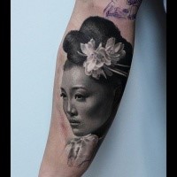 Realism style beautiful looking forearm tattoo of Asian woman