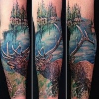 Realism style big natural colored forearm tattoo of deer on wild life and lake