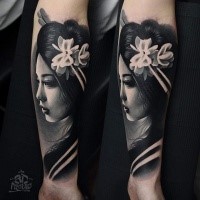 Realism style black and white forearm tattoo of geisha portrait