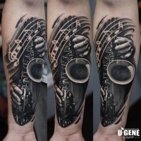 Realism style black and white forearm tattoo of sax and notes