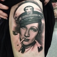 Realism style black and white smoking woman portrait tattoo on thigh