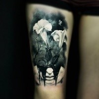 Realism style black and white thigh tattoo of beautiful flowers