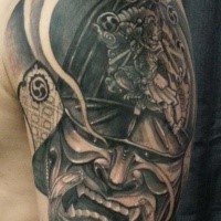 Realism style black ink big shoulder tattoo of angry samurai helmet and mask