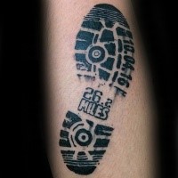 Realism style black ink foot print tattoo with lettering