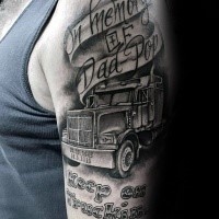 Realism style black ink shoulder tattoo of big truck and lettering