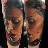 Realism style colored arm tattoo of beautiful woman