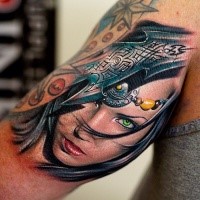 Realism style colored arm tattoo of fantasy woman portrait with helmet