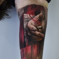Realism style colored arm tattoo of hand nailed to wooden cross