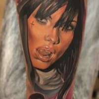 Realism style colored arm tattoo of sexy woman with cross