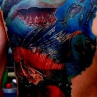 Realism style colored back tattoo of bloody shark and fishes