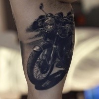 Realism style colored biceps tattoo of cool bike