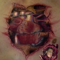 Realism style colored chest tattoo of broken bones with heart