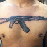 Realism style colored chest tattoo of typical AK rifle