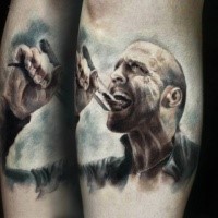 Realism style colored forearm tattoo of movie Jason Statham