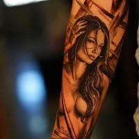 Realism style colored forearm tattoo of sexy naked woman
