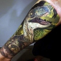 Realism style colored forearm tattoo of roaring dinosaur