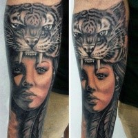 Realism style colored forearm tattoo of woman with tiger skin