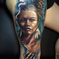 Realism style colored Indian woman portrait tattoo on thigh