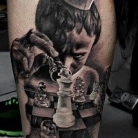 Realism style colored leg tattoo of boy with chess and crown