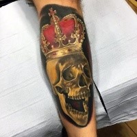 Realism style colored leg tattoo of human skull with big crown