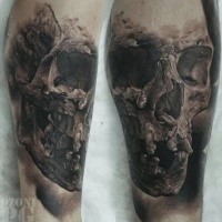 Realism style colored leg tattoo of human skull