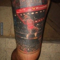 Realism style colored Michael Jordan tattoo on thigh