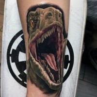 Realism style colored roaring dinosaur tattoo on arm