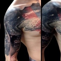 Realism style colored shoulder and chest tattoo of football stadium