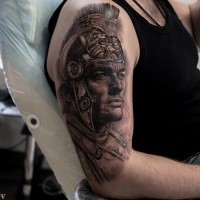 Realism style colored shoulder tattoo of ancient warrior in helmet