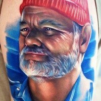 Realism style colored shoulder tattoo of old man with beard