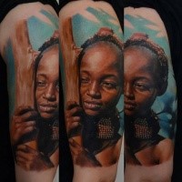 Realism style colored shoulder tattoo of tribal human