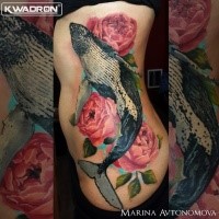Realism style colored side tattoo of big whale and roses