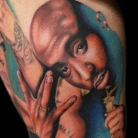 Realism style colored tattoo of 2Pac portrait