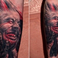 Realism style colored tattoo of bloody man face