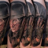 Realism style colored tattoo of Fred Kruger portrait