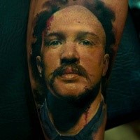 Realism style colored tattoo of man with mustache