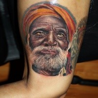 Realism style colored tattoo of old man with beard