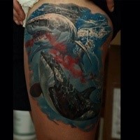 Realism style colored thigh tattoo of bloody whale and shark