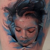 Realism style colored thigh tattoo of drowned woman