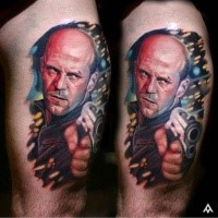 Realism style colored thigh tattoo of famous actor with pistol