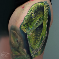 Realism style colored thigh tattoo of big green snake