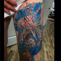 Realism style colored thigh tattoo of big realistic looking fish