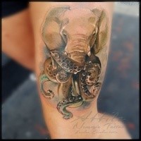 Realism style colored thigh tattoo of big elephant with octopus