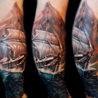 Realism style very beautiful looking colored tattoo of old sailing ship