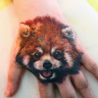 Realism style very detailed small dog portrait tattoo on hand